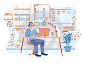 Man using headphones and working in front of computer. Developing a website on a computer.