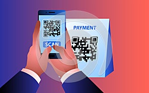 Man using his mobile phone to scan a QR code photo