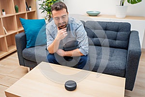 Man using home assistant bluetooth speaker