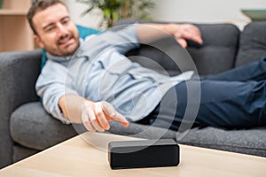 Man using home assistant bluetooth speaker