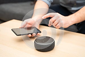 Man using home assistant bluetooth speaker