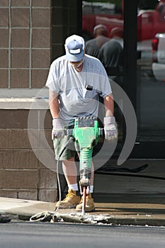Man using jack hammer