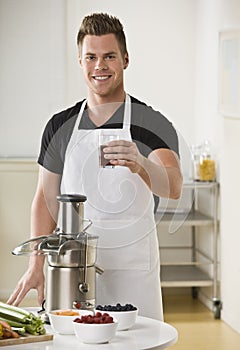 Man Using Juicer