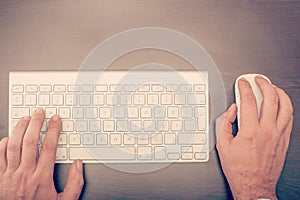 Man using keyboard and mouse