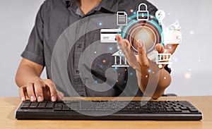 A man is using a keyboard to search the internet, online shopping ideas by typing on a keyboard and using a computer.