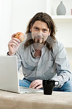 Man using laptop computer