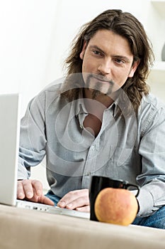 Man using laptop computer