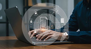 Man using laptop with digital document management system concept