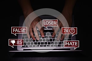 Man using laptop and icons with offensive messages, closeup. Cyber bulling concept photo