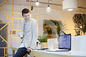 Man using laptop in office