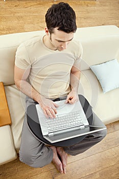 Man using laptop overhead view