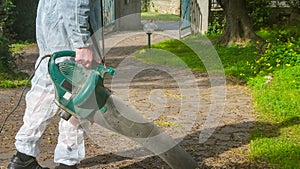 Man using a leaf blower