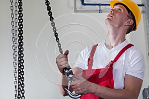 Man using lifting hook at work