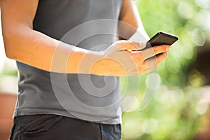 Man using mobile smart phone outdoor