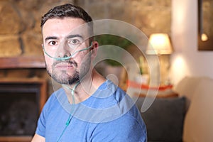 Man using nasal breathing aid
