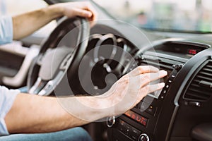 Man using navigation system while driving car