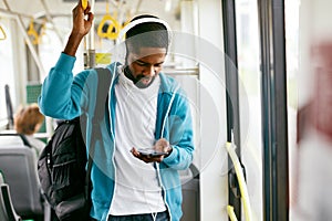 Man Using Phone, Listening Music Traveling In Train