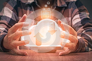 Man using phone to upload and back up cloud computing in hand cloud technology data storage