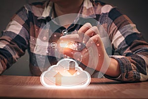 Man using phone to upload and back up cloud computing in hand cloud technology data storage