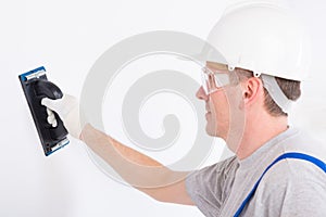 Man using plastering trowel