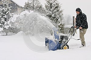Man using a powerful snow blower
