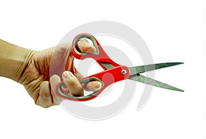 Man using red scissors on white background