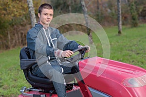 Man using ride on mower