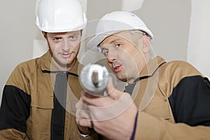 Man using silicone tube with apprentice