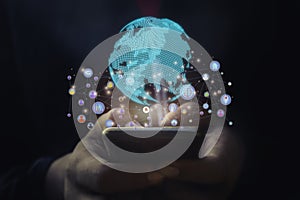 A man using smart phone analyzing graph for data management to make report.