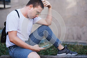 Man using smart phone connect communication. Emotional isolation, technology depresion photo