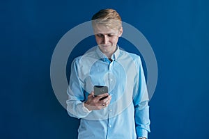 Man using smartphone he holding mobile smart phone, using app photo