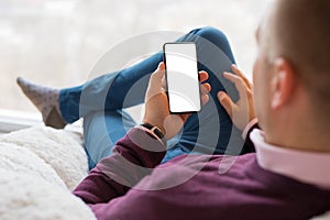 Man using smartphone. Mobile phone screen mockup.