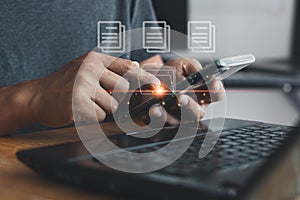 Man using smartphone to manage files, Document Management System DMS, online documentation database, process automation