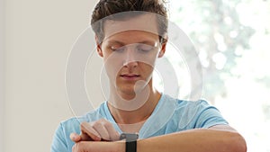 Man Using Smartwatch Applications