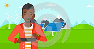 Man using tablet computer. photo