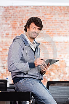 Man using tablet computer casual businessman smile