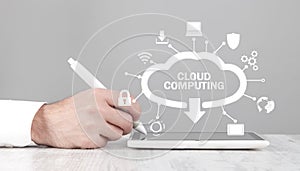 Man using tablet computer. Cloud Computing