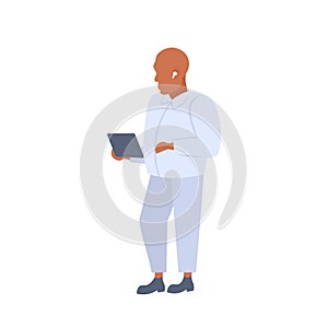 Man using tablet listening to music in wireless earphones elegant african american person wearing white suit male