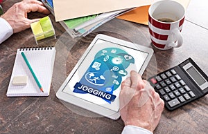 Jogging concept on a tablet