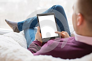 Man using tablet. Tablet vertical screen mockup.