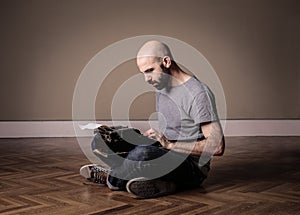 Man using typewriter