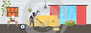 Man using vacuum cleaner male janitor in uniform vacuuming doing housework cleaning service concept modern living room