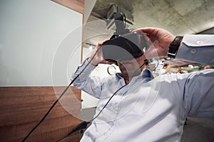 Man using virtual reality gadget computer glasses