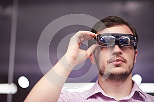 Man using virtual reality gadget computer glasses