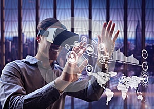 Man using virtual reality headset with networking icons