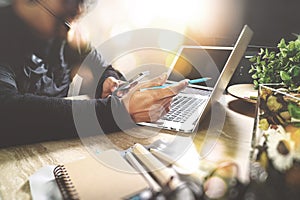 Man using VOIP headset with digital tablet computer docking smart keyboard, concept communication, it support, call center and cu