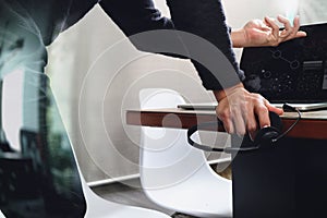 Man using VOIP headset with digital tablet computer docking smart keyboard, concept communication, it support, call center and cu