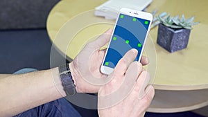 Man using White Smartphone Display Screen with Touch Gestures