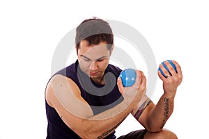 Man using yoga ball weights