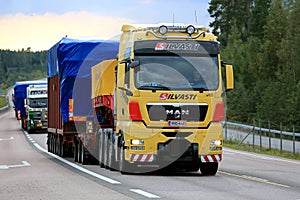 MAN V8 Wide Load Transport along Road